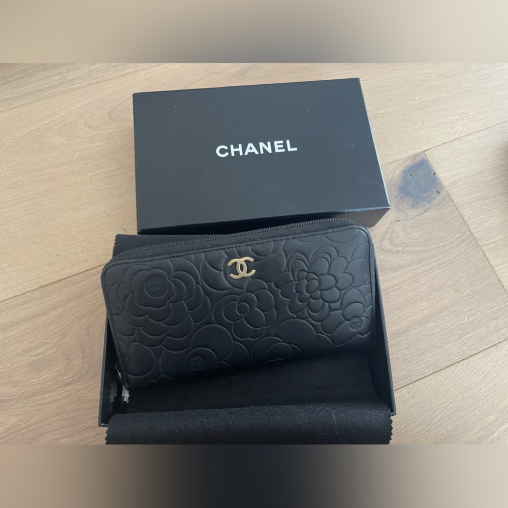 Chanel black leather camellia lambskin gold zip around wallet